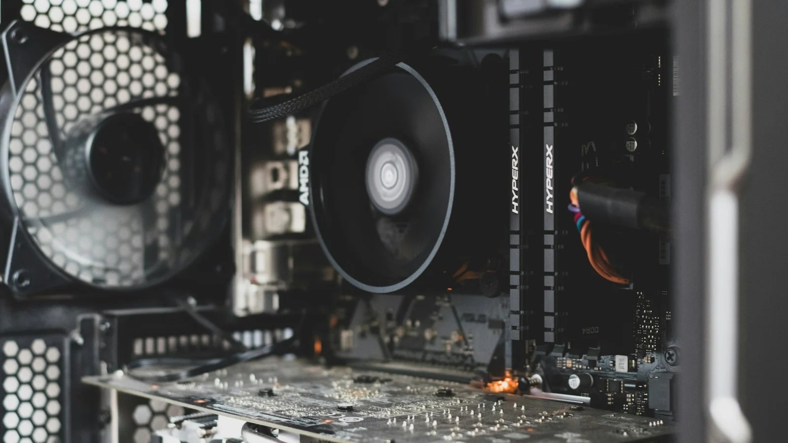 Processor cooler and fans inside an open PC case