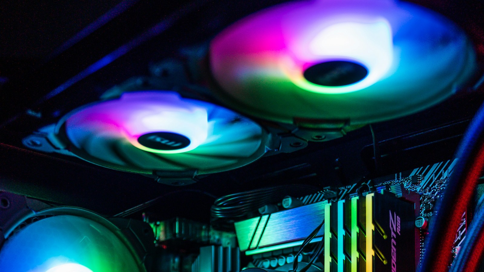 Gaming PC with RGB liquid cooler fans and RAM lit up
