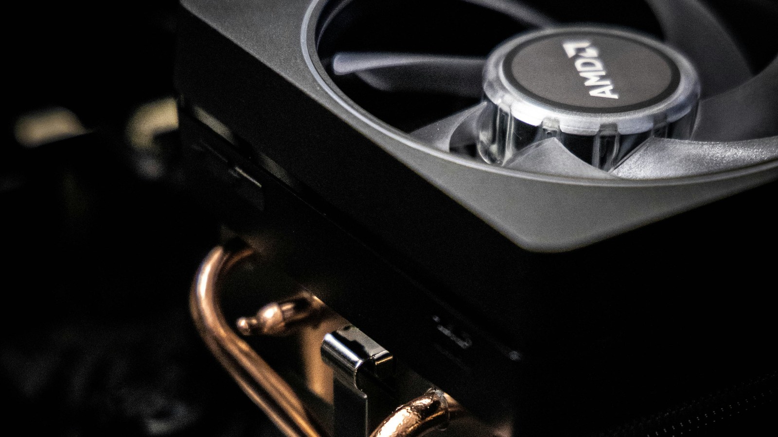 Tower CPU cooler with copper heat pipes on a motherboard