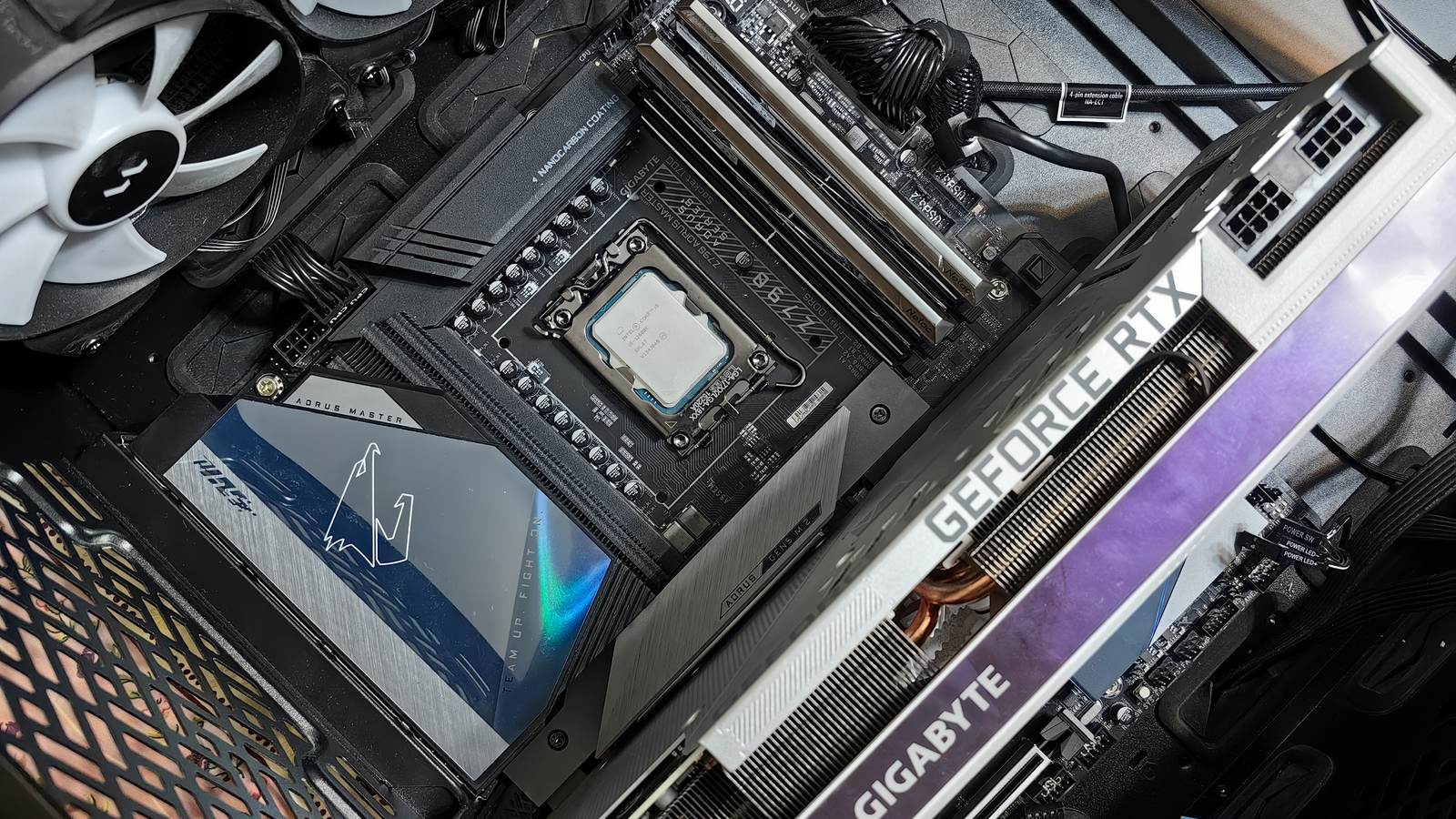 Inside a newly assembled PC showing the processor, memory slots, cooler fan and graphics card